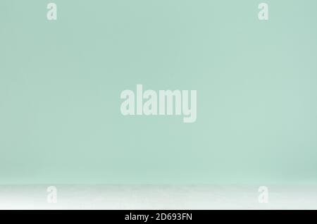 Abstract green mint menthe background with perspective and white wood table for presentation and showing, room. Stock Photo