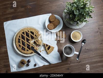 the table set for breakfast on a wooden table in autumn Stock Photo