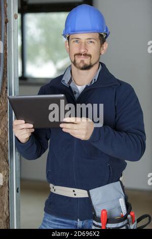 architect site manager with tablet in hands Stock Photo