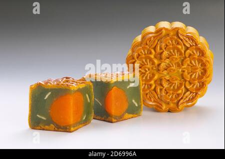 Green tea paste with single yolk mooncake for Chinese Mid Autumn Festival celebration Stock Photo