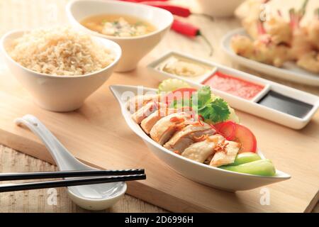 Hainanese chicken rice with ginger, chili and soy sauce Stock Photo