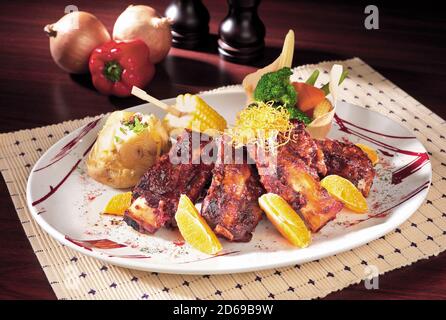 Grilled lamb steak with vegetables and mashed potatoes Stock Photo