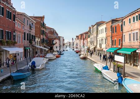 The Venetian Lagoon island of Murano with Rio dei Vetrai and colourful buildings either side. Murano, Venice, Italy. 2020 Stock Photo