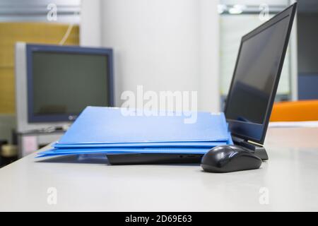 file folder with documents With Notebook on table in meeting room Stock Photo