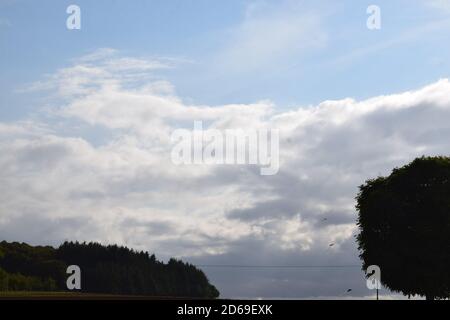 Drachensteigen, dark clouds sky Stock Photo