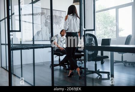 Young business people in formal clothes working in the office Stock Photo