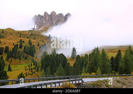 Beautiful View of the Dolomitic massif in the Italian Dolomites with cloudy sky. Italy Stock Photo