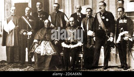 1929  A portrait of Mussolini and Cardinal Gaspari (left) after they signed a treaty creating the Vatican State within Rome assuring the Pope of his sovereignty under a pact  between Pius XI and Mussolini.The treaty between the Holy See and Italy was signed on February 11, 1929 at the Lateran Palace . Stock Photo