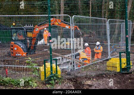 Denham, UK. 15th October, 2020. HS2 appear to have started preparatory work on building a temporary bridge that will be used for  construction traffic and machinery going across the chalk stream River Colne in Denham Country Park, however, according to the relevant planning application on the Buckinghamshire Council website, planning permission for the building of the new temporary bridge is still awaiting a decision from the Council. The HS2 High Speed rail from London to Birmingham has been widely criticised by enviromental campaigners due to the detrimental destruction it is causing to the Stock Photo