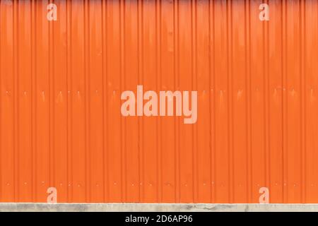Orange corrugated metal or zinc texture surface or galvanize steel industrial texture and background. Stock Photo