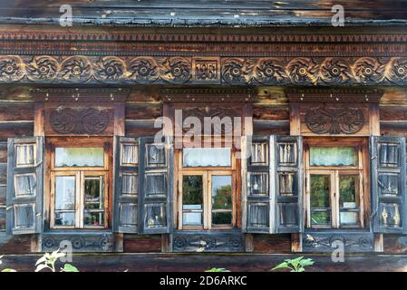 facade of old wooden house in museum of wooden architecture in Suzdal, Russia