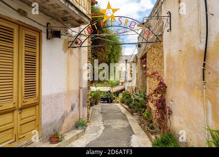 Parrini, Sicily, Italy - September 27, 2020: Narrow street in the center of ancient village Parrini in the municipality of Partinico, province of Pale Stock Photo