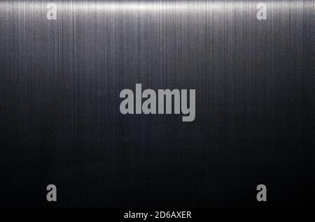 Metallic wall background, texture. Grey or dark-gray smooth painted surface. Stock Photo