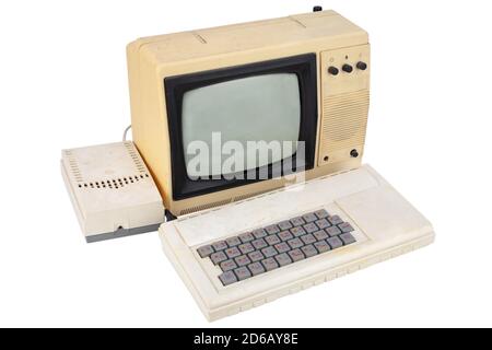 old 8 bit computer with monitor from tv set isolated on white Stock ...