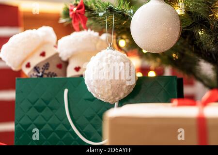 Xmas, winter, new year, Celebration, family, gift concept - Holiday atmosphere at home. Bright presents boxes under Christmas tree decorated with Stock Photo