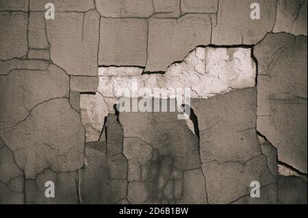 Aged cement wall texture. cracked concrete wall covered with gray cement surface as background. Stock Photo