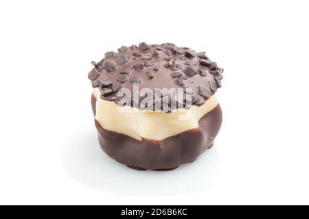 Single chocolate candy isolated on white background. side view, close up. Stock Photo