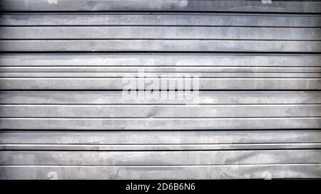 Closed Metal Storefront Gate Painted Silver Grey Stock Photo