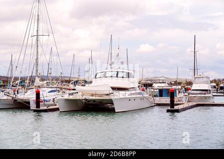 Yeppoon, Queensland, Australia - December 2019: Pleasure boats anchored at moorings at the marina Stock Photo