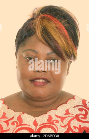 Face of happy fat black African woman smiling Stock Photo