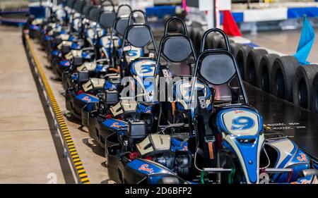 Mackay, Queensland, Australia - January 2020: A line up of empty go-karts ready to recreational race a circuit in a public event Stock Photo