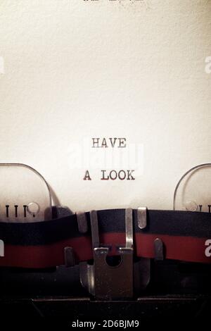 Have One Look Have a look phrase written with a typewriter Stock Photo - Alamy