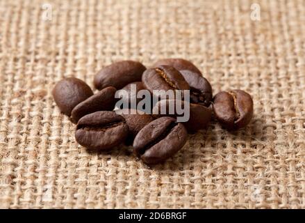 Coffee beans on a rough sacking Stock Photo