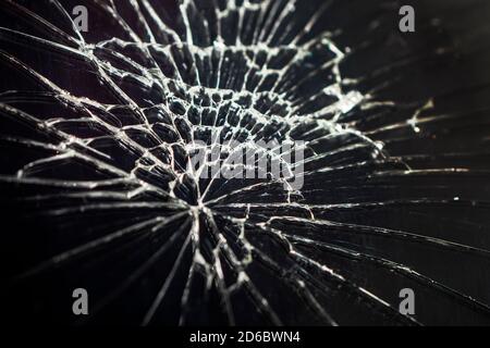 Cracked screen Smartphone from shock. top view. Background. Stock Photo