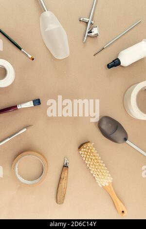 Shaped holders, brushes and brushes for cleaning, painting and repairing shoes. A set of objects and tools for the work of a shoe master. Stock Photo
