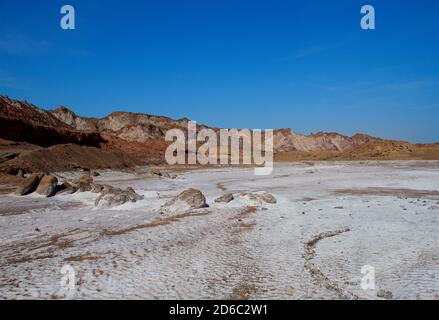 Scenic panoramic view of salty desert, Iran. Salty valley landscape in Iran, Persia Stock Photo
