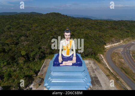 Buddha statue in Bokor hillstation in Kampot Cambodia , Bokor national park cambodia Aerial drone Photo Asia Stock Photo