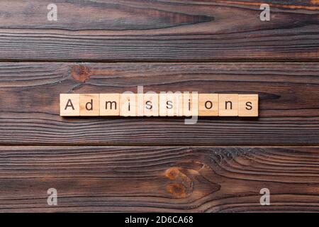 admissions word written on wood block. admissions text on table, concept. Stock Photo