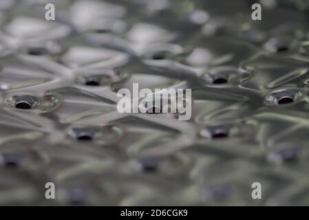 Stainless steel interior of a washing machine drum Stock Photo