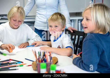 Boys in classroom Stock Photo