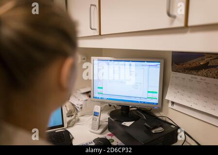 Computer screen on desk Stock Photo