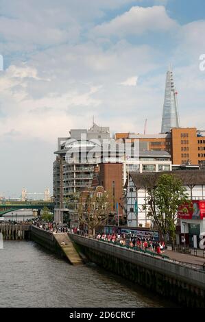 River Thames with Shakespeare's Globe Theatre, The Shard and Tower Bridge in the background, London, England.