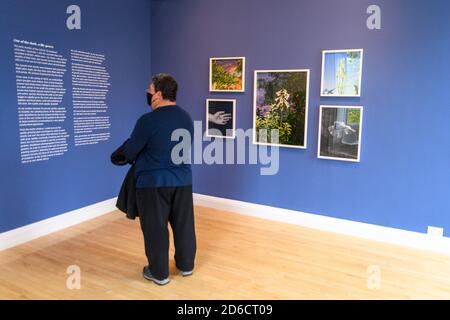 Friday 16 October 2020. Edinburgh, UK. Visitors at the “Florilegium: A gathering of flowers” exhibition at Inverleith House in the Royal Botanic Garden Edinburgh. The biennial exhibition is the first of a new programme as Inverleith House begins its transformation into Climate House after four years of closure, following the award of Outset Contemporary Art Fund’s Transformative Grant. Stock Photo