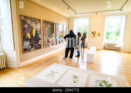 Friday 16 October 2020. Edinburgh, UK. Visitors at the “Florilegium: A gathering of flowers” exhibition at Inverleith House in the Royal Botanic Garden Edinburgh. The biennial exhibition is the first of a new programme as Inverleith House begins its transformation into Climate House after four years of closure, following the award of Outset Contemporary Art Fund’s Transformative Grant. Stock Photo