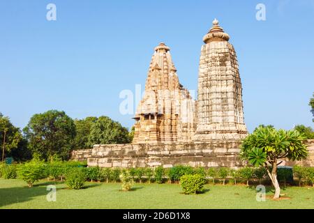 Khajuraho, Madhya Pradesh, India : Vishvanatha Temple (left) and Parvati Temple (right) part of the western group of the UNESCO World Heritage Site Kh Stock Photo