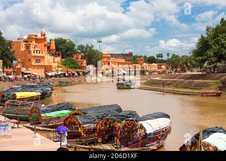 Chitrakoot, Madhya Pradesh, India : Colourful boats line near the steps of Ramghat on the Mandakini river where during their exile period Lord Rama, L Stock Photo