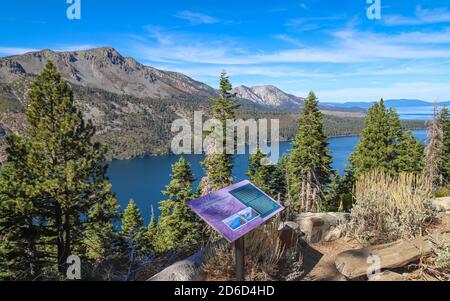 SOUTH LAKE TAHOE, CALIFORNIA, UNITED STATES - Oct 14, 2020: An interpretive sign sits at the Angora Lookout viewpoint, overlooking Fallen Leaf Lake an Stock Photo