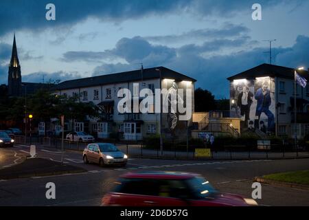 17.07.2019, Derry, Northern Ireland, United Kingdom - Houses with Wall Murals in the Catholic district of Bogside, only metres from the site of the Bl