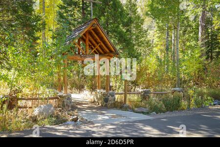 SOUTH LAKE TAHOE, CALIFORNIA, UNITED STATES - Oct 14, 2020: The entrance to the St. Francis of the Mountains Fallen Leaf Chapel in the community of Fa Stock Photo