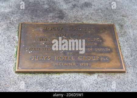 Dublin, Ireland - 10 November 2015: Information bronze plaque on Molly Malone on Suffolk Street. Stock Photo