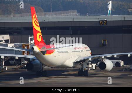 TOKYO, JAPAN - DECEMBER 5, 2016: Hongkong Airlines Airbus A330 at Narita Airport of Tokyo. The airport is the 2nd busiest airport of Japan with 34,751 Stock Photo