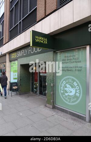 LONDON, UK - JULY 7, 2016: People walk by Marks & Spencer Simply Food grocery store in London. Simply Food is a special convenience store format by Ma Stock Photo