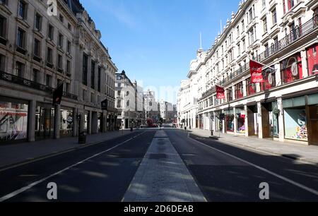 A quiet Regent Street the day after Prime Minister Boris Johnson put the UK in lockdown to help curb the spread of the coronavirus forcing shops selli Stock Photo