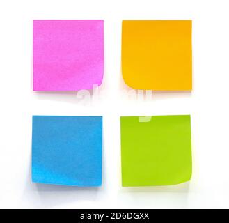 Collection of different colored sheets of note papers Isolated on white background Stock Photo