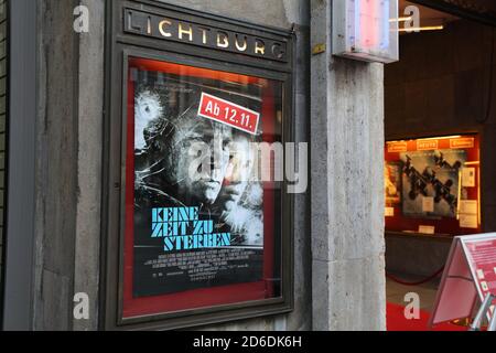ESSEN, GERMANY - SEPTEMBER 20, 2020: Poster for upcoming James Bond movie "No time to die" ("Keine Zeit zu sterben") displayed in a movie theater in E Stock Photo
