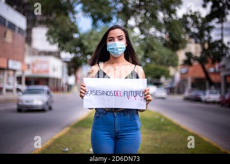 Valencia, Valencia, Venezuela. 16th Oct, 2020. THE YOUNG PEOPLE OF THE PRIMERO JUSTICIA POLITICAL PARTY, REPORTED THIS MORNING, TO THE CONSULATE OF COLOMBIA IN THE Valencia OF VALENCIA, CARABOBO IN VENEZUELA, ABUSE OF HUMAN RIGHTS TO WHICH VENEZUELANS ARE SUBJECTED Credit: Elena Fernandez/ZUMA Wire/Alamy Live News Stock Photo